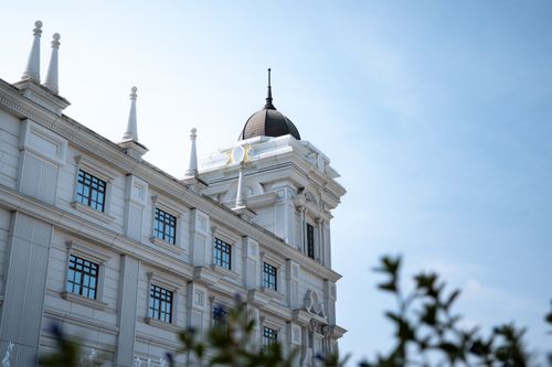Free Elegant European-style building facade with blue sky, shot in Chiayi County, Taiwan. Stock Photo