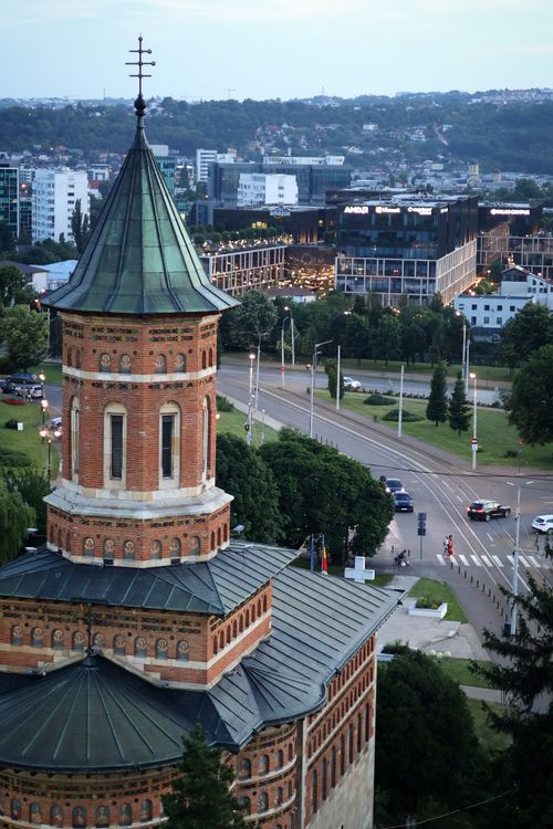 Free Aerial view of historical Romanian architecture amidst a modern cityscape at dusk. Stock Photo