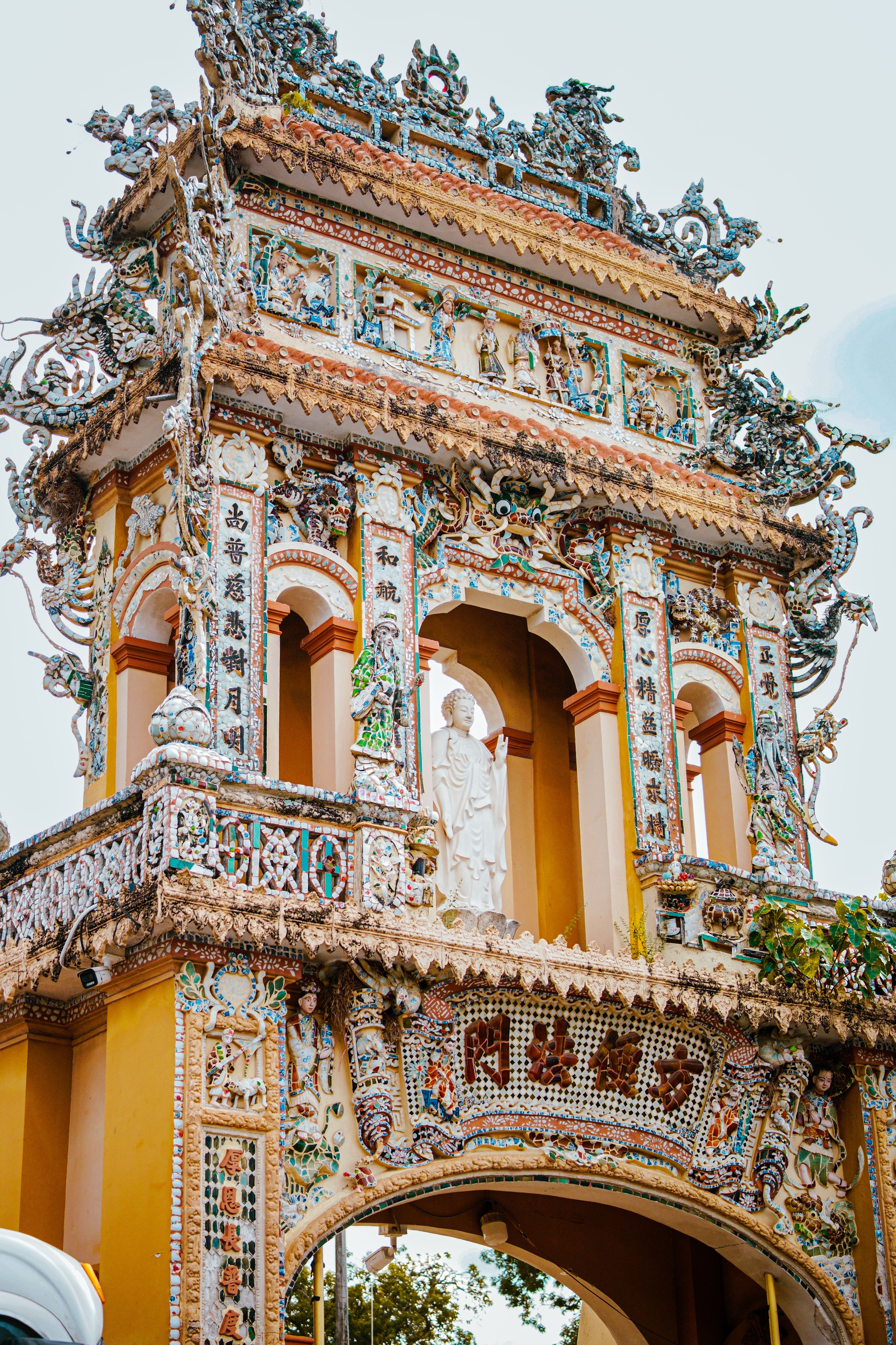A detailed view of a decorated pagoda in My Tho, Dong Thap, Vietnam, showcasing intricate designs.