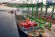 Blue and Red Cargo Ship on Dock