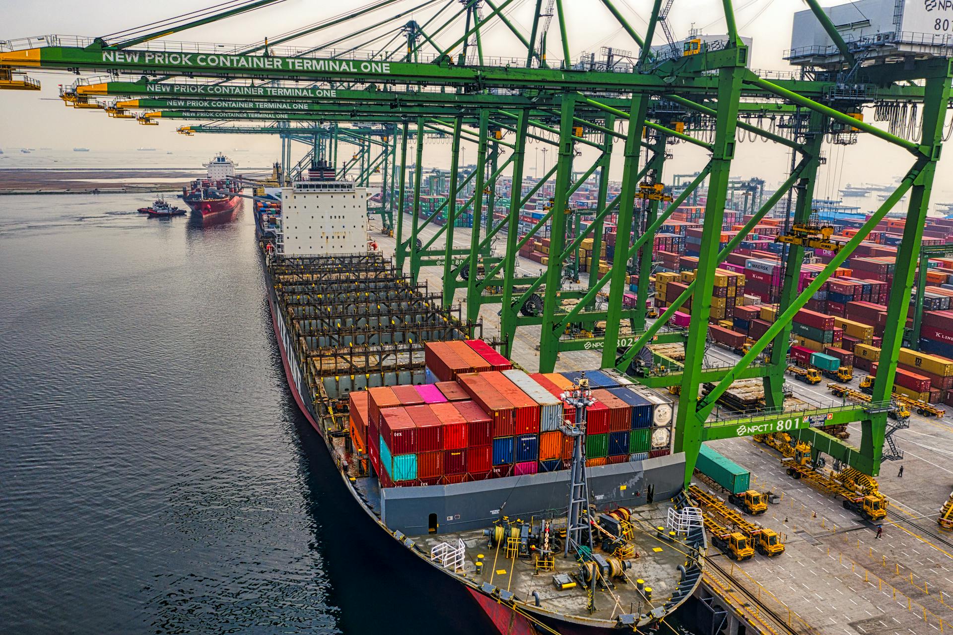 Blue and Red Cargo Ship on Dock