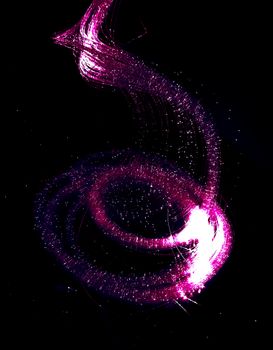 Vibrant pink neon light streak forming artistic swirl against dark backdrop.