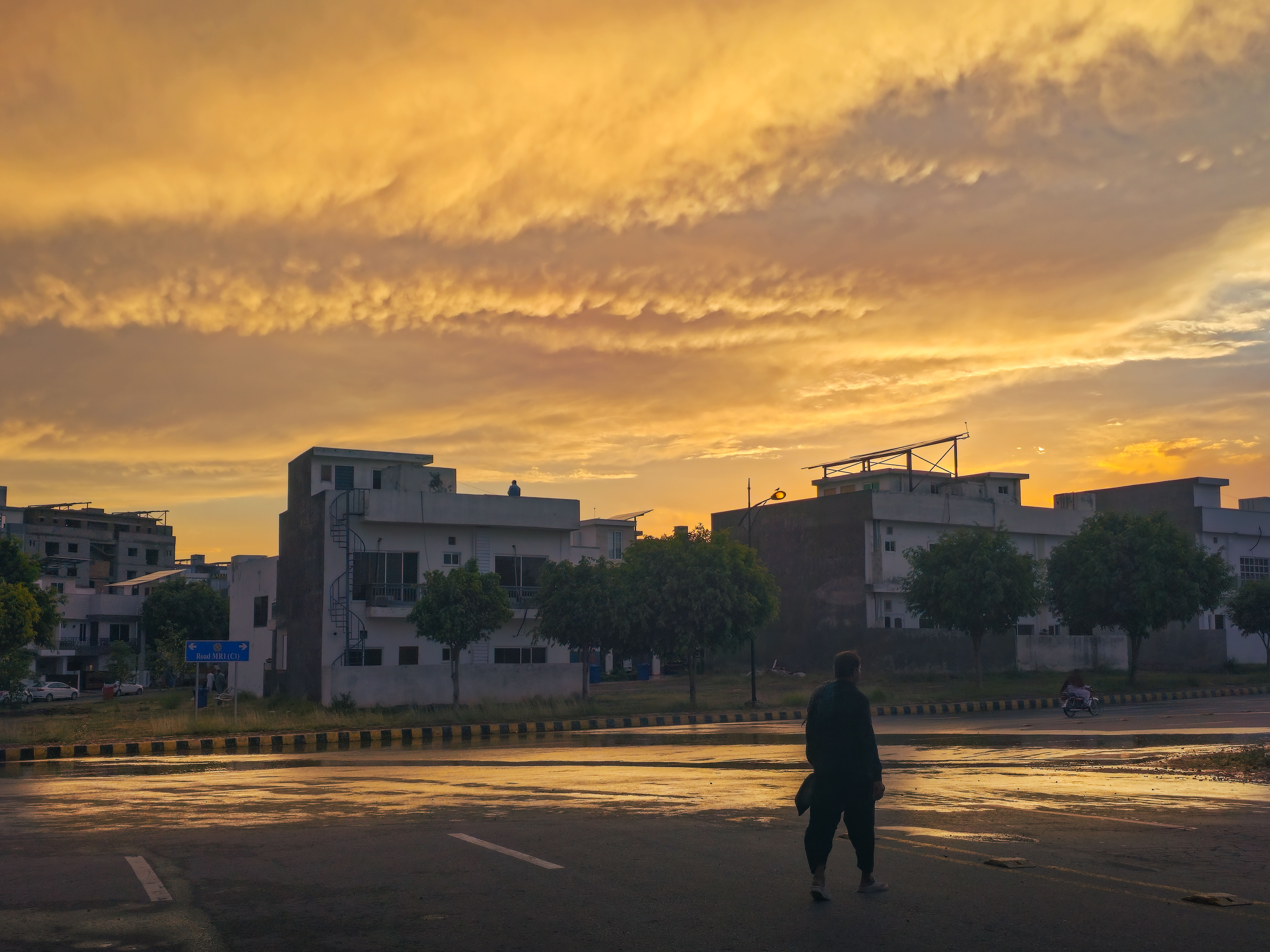 Rain on Chandigarh Sector 17 plaza with reflections in wet stone