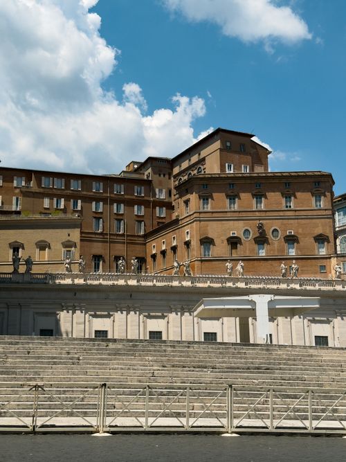 Free View of historical architecture and empty steps at St. Peter's Square, Vatican City. Stock Photo