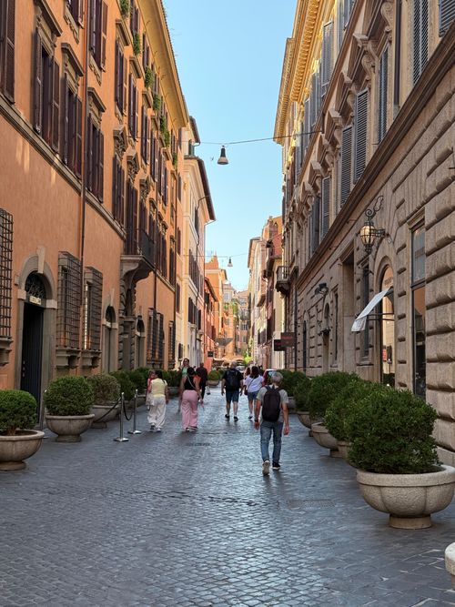 Free Stroll through Via del Babuino in Rome, showcasing classic architecture and vibrant street life. Stock Photo