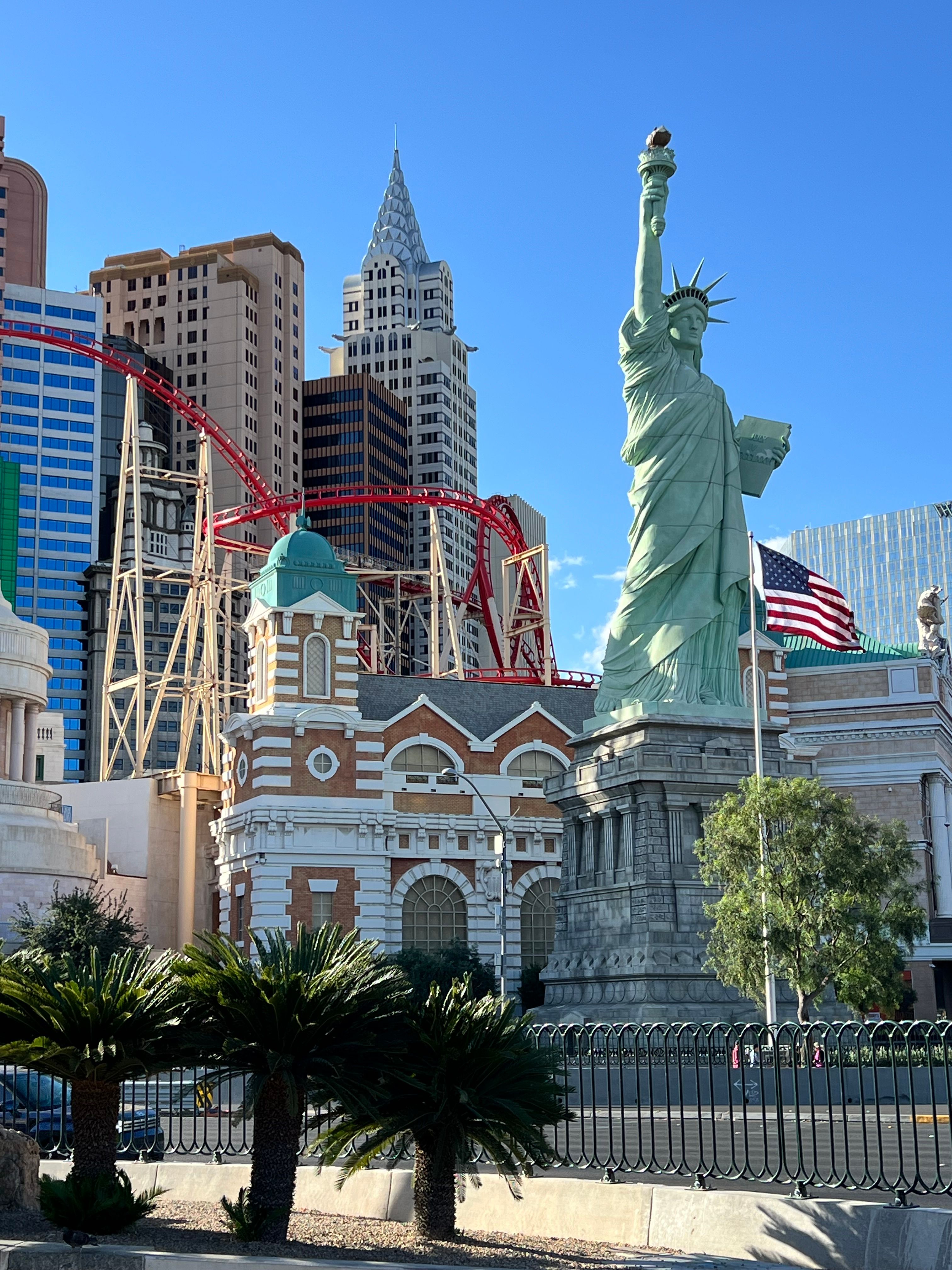 Statue of Liberty replica at New York-New York Hotel, Las Vegas under clear sky.