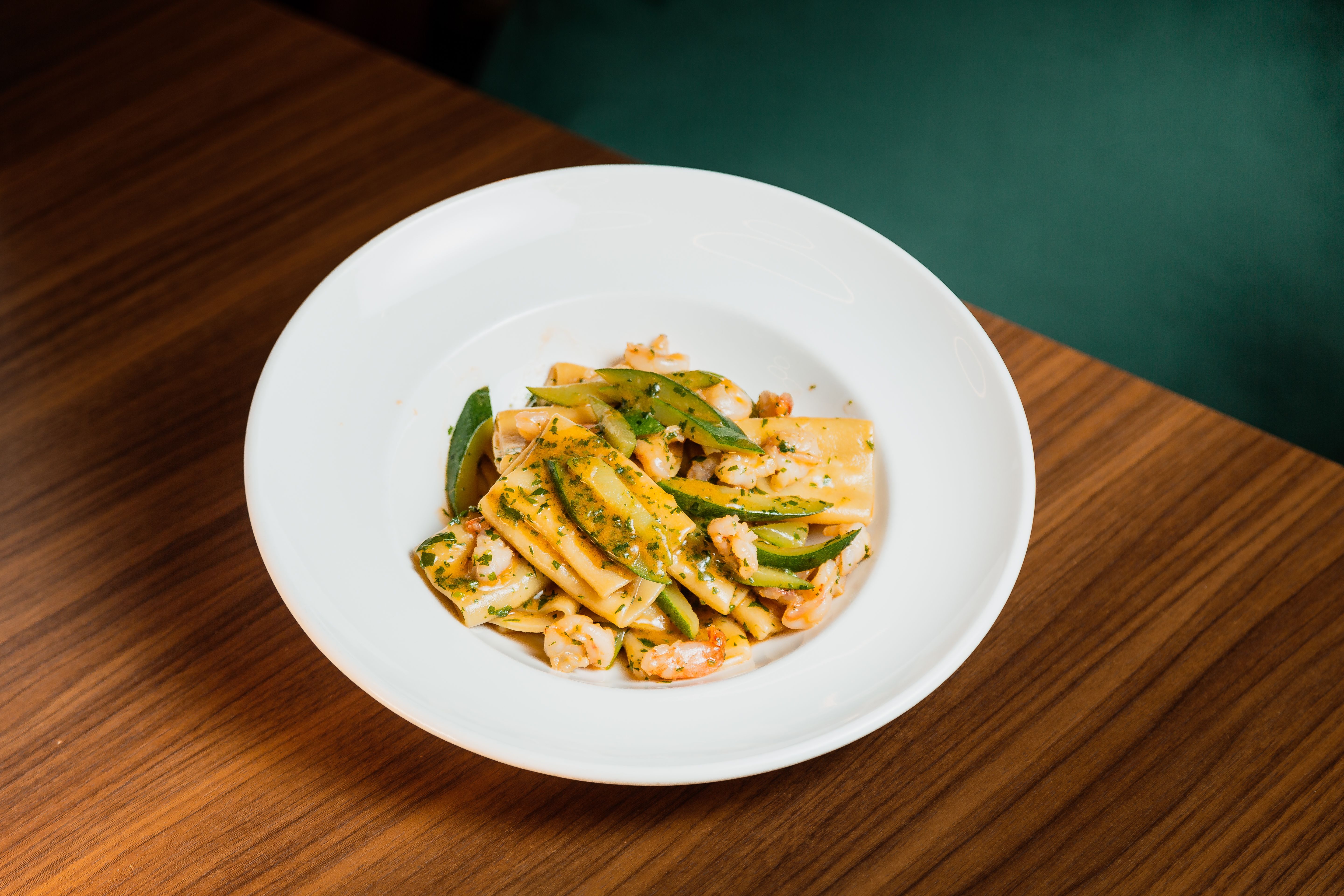 Basil-Pesto Ravioli with Wilted Greens