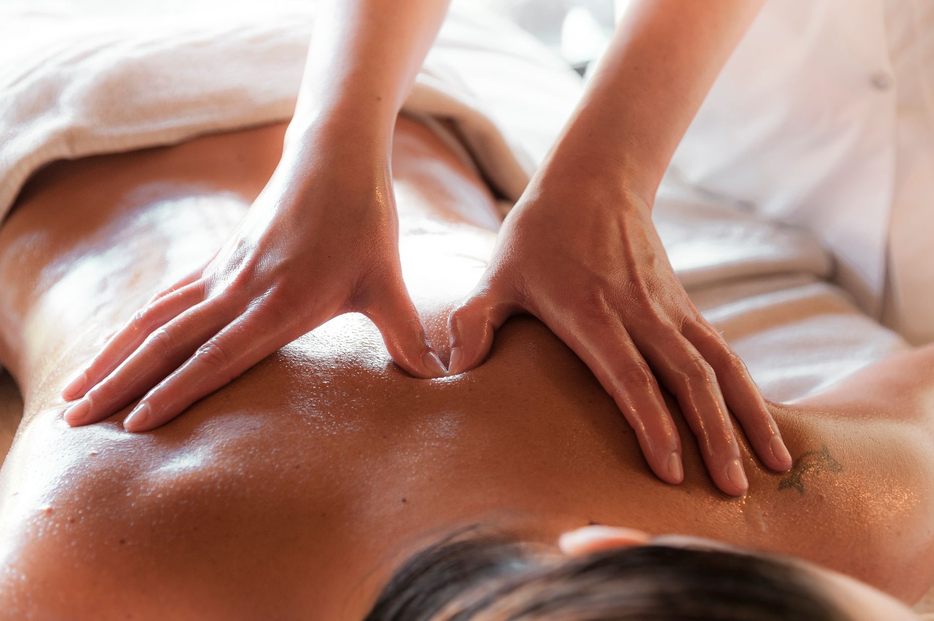 Warm oil being poured during an Ayurvedic treatment at a centre in Kochi