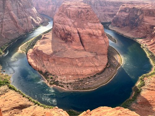 Free Breathtaking aerial view of Horseshoe Bend showcasing the Colorado River's majestic curve. Stock Photo