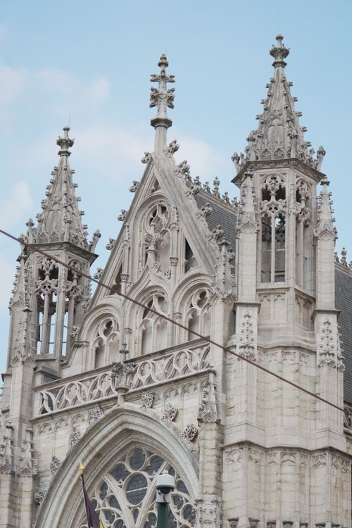 Free Intricate Gothic spires of Notre Dame du Sablon against a clear sky in Brussels, Belgium. Stock Photo