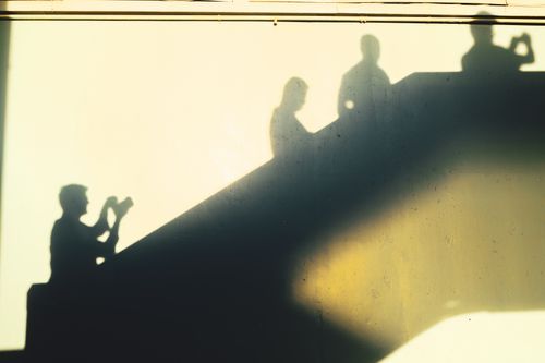 Free Artistic shadows of people on a wall in İstanbul, creating a silhouette effect. Stock Photo