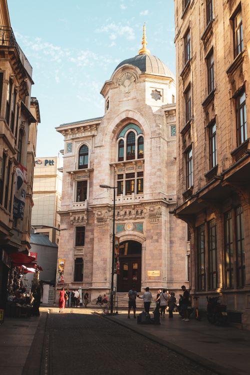 Free A bustling street in Istanbul with historical architecture and lively atmosphere. Stock Photo