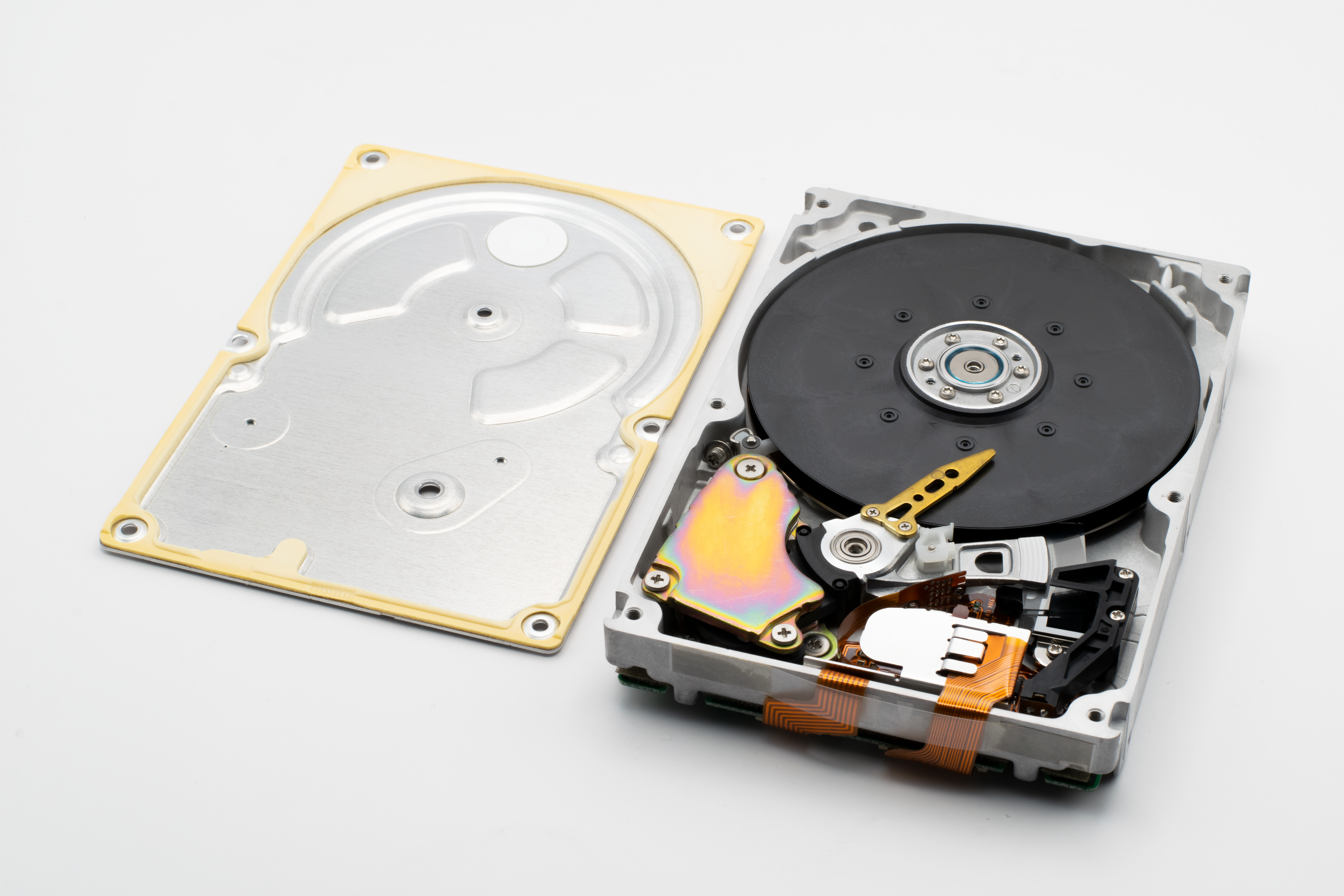 Close-up of an open hard drive showing internal components.