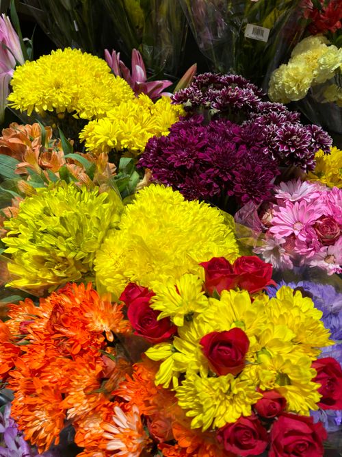 Free A stunning assortment of colorful fresh flowers on display, showcasing vibrant hues and lush blooms. Stock Photo