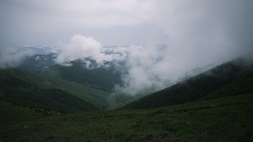 Free Lush green mountains shrouded in mist, Shanxi Province, a tranquil natural scene. Stock Photo