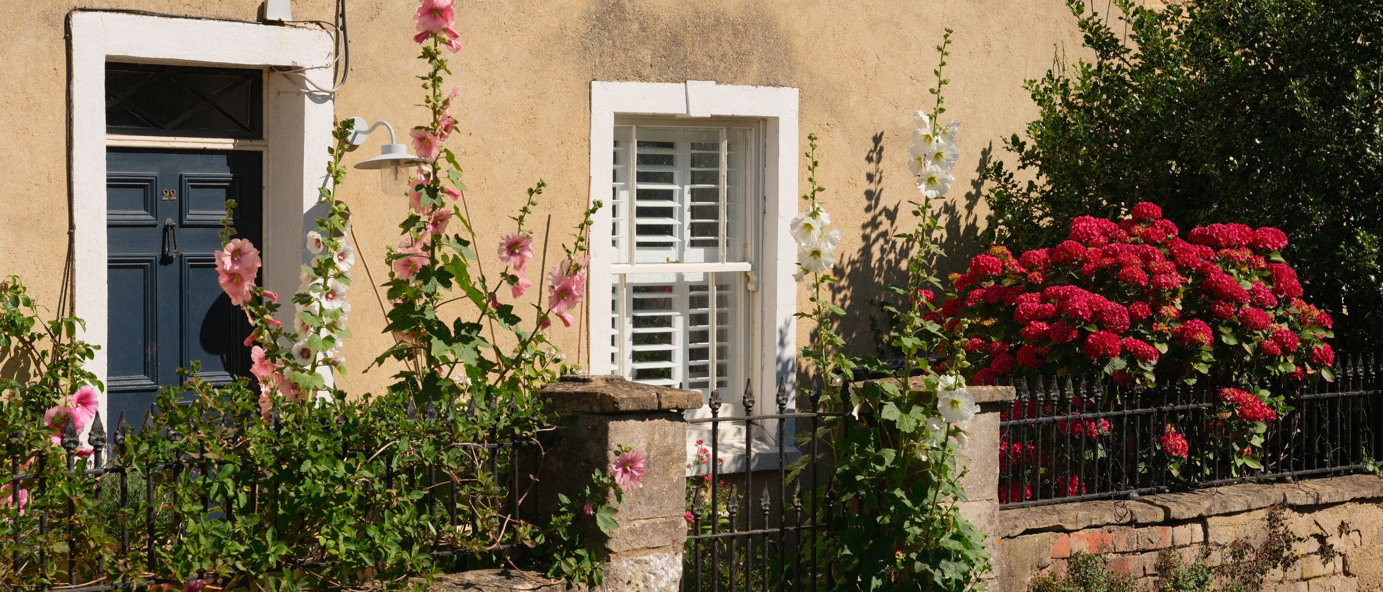 Exterior Painting in Holloway — walls rolled to an even, flat finish