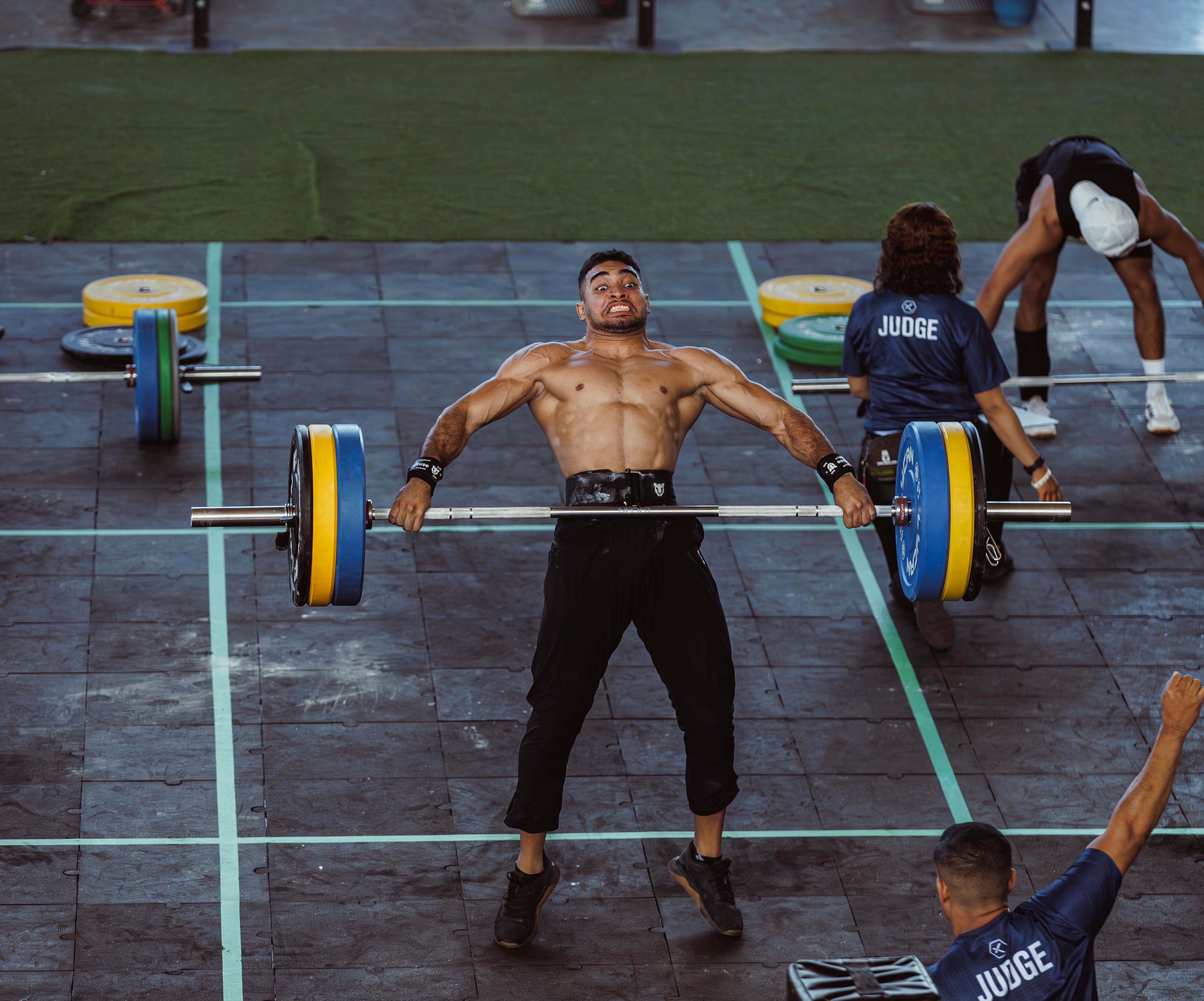 Athlete applying an all-natural performance patch before training