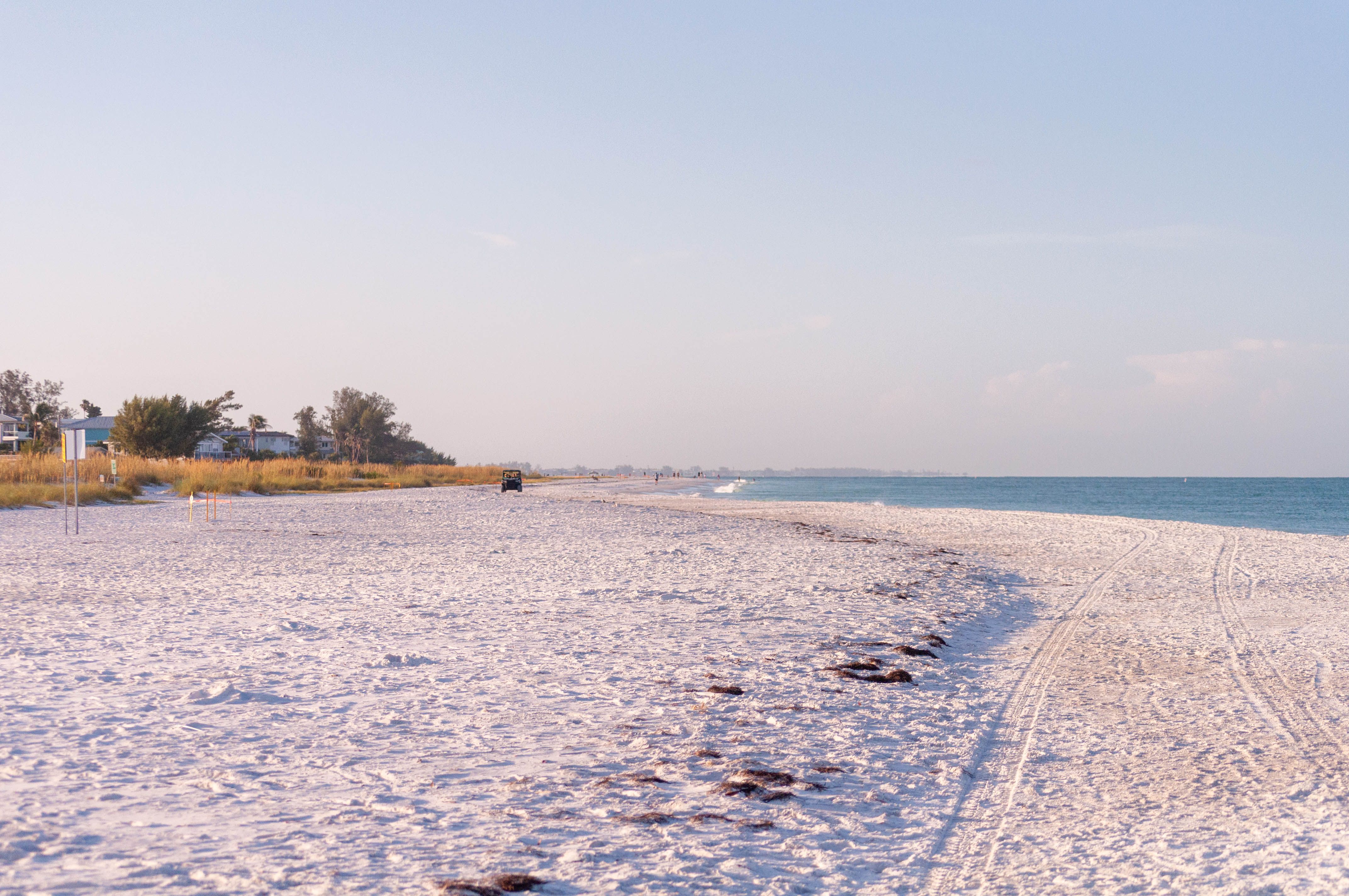 White sand beach and clear emerald water on the Emerald Coast of Florida near 30A and Destin