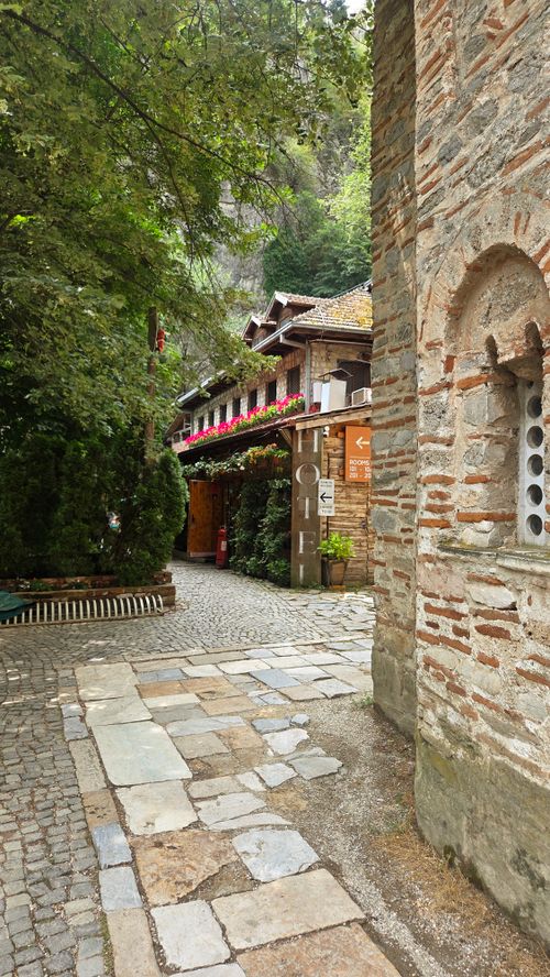 Free Explore a charming cobblestone street lined with historic architecture in Skopje, North Macedonia. Stock Photo