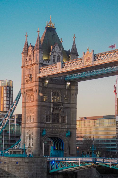 Free Scenic view of Tower Bridge in London at sunset, showcasing iconic architectural design. Stock Photo