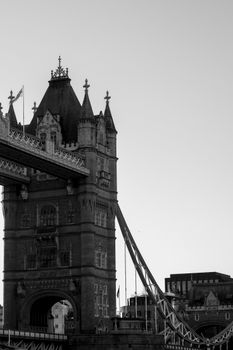 A striking black and white image of London's iconic Tower Bridge, showcasing its historic architecture.
