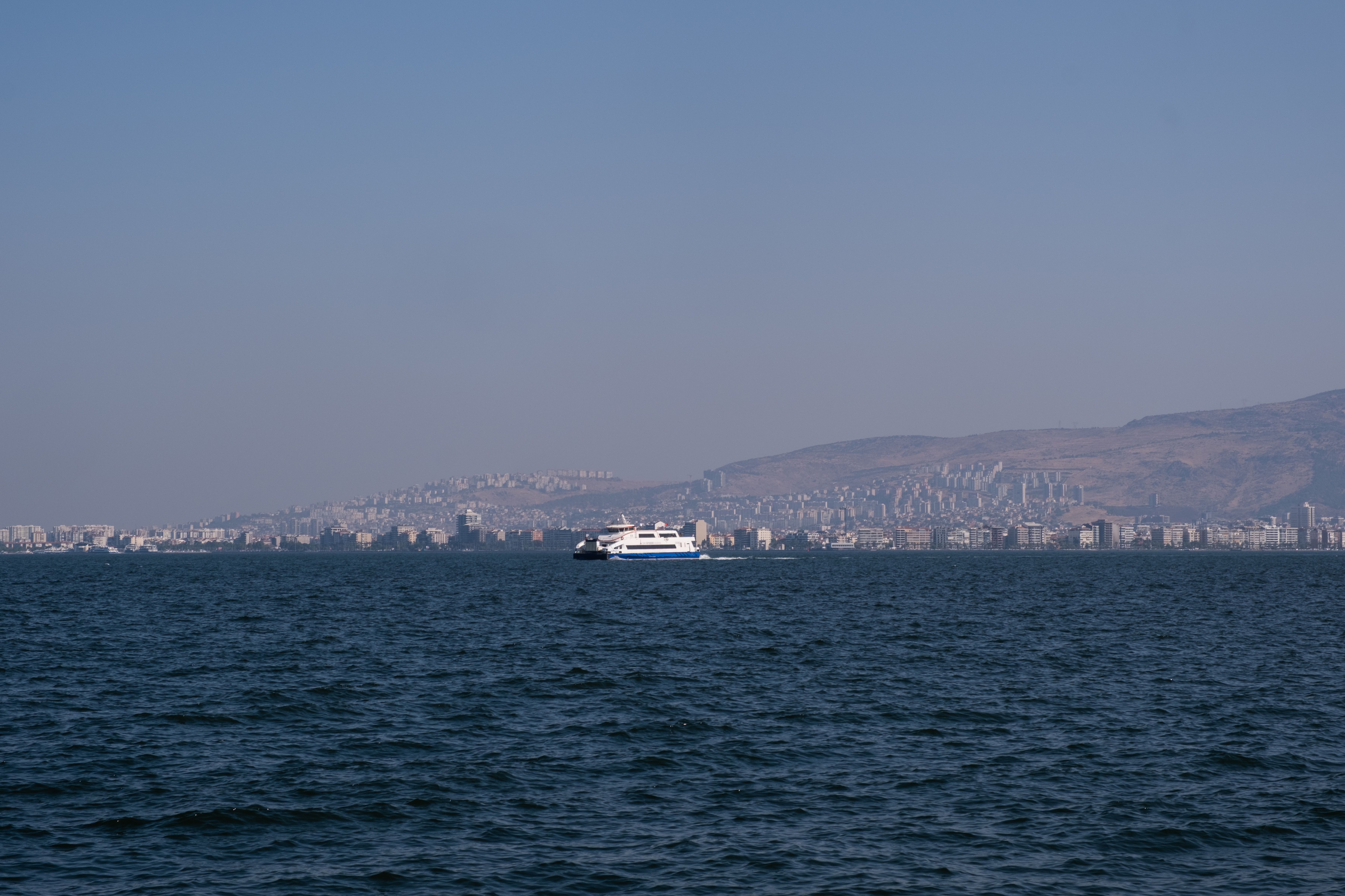 Public ferry crossing the Nile with the West Bank hills behind