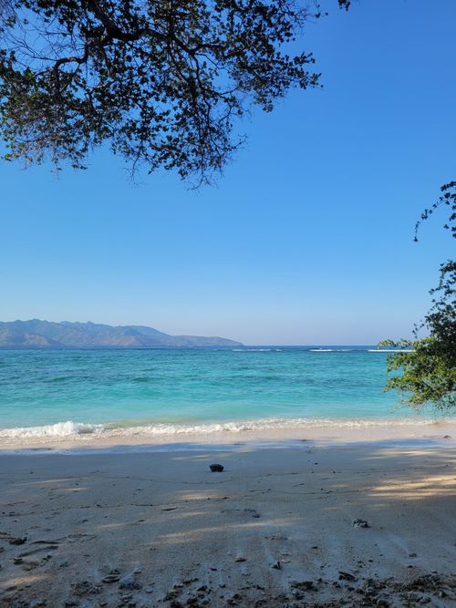 Free Tranquil beach view with turquoise waters in West Nusa Tenggara, perfect for travel inspiration. Stock Photo