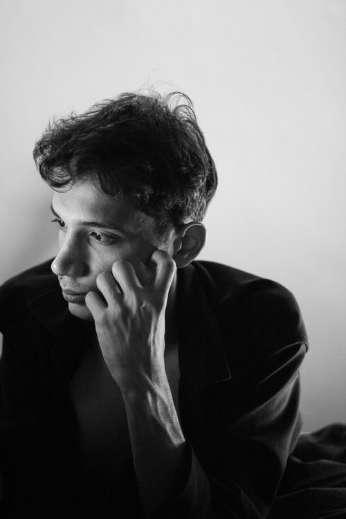 Free Thoughtful black and white portrait of a young man. Stock Photo