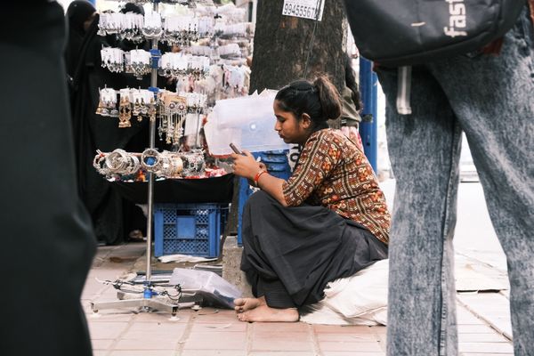 Street vendor selling jewelry in Bengaluru market