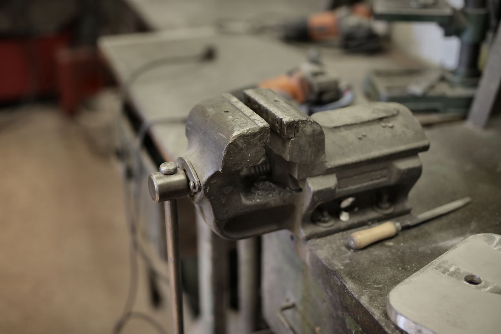 A workbench with tools laid out