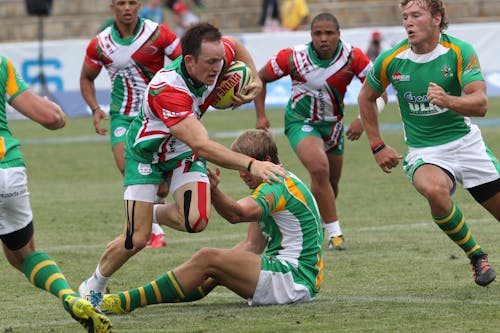 Group of Men Playing Rugby