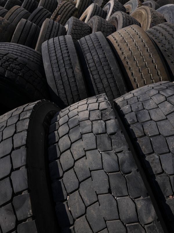 Rows of used truck and car tires