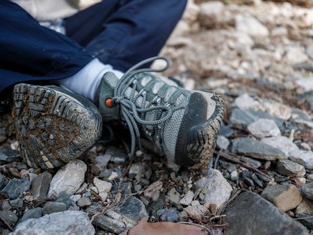 Hiker on a trail wearing gear