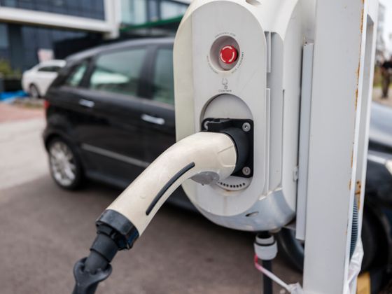 Charging connector plugged into a station — photo by Engin Akyurt on Pexels
