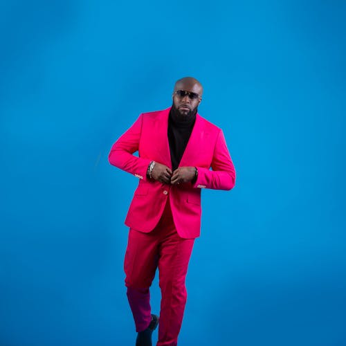Man in Pink Suit Jacket and Pants