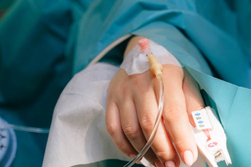 Free Patient with Iv Line Stock Photo