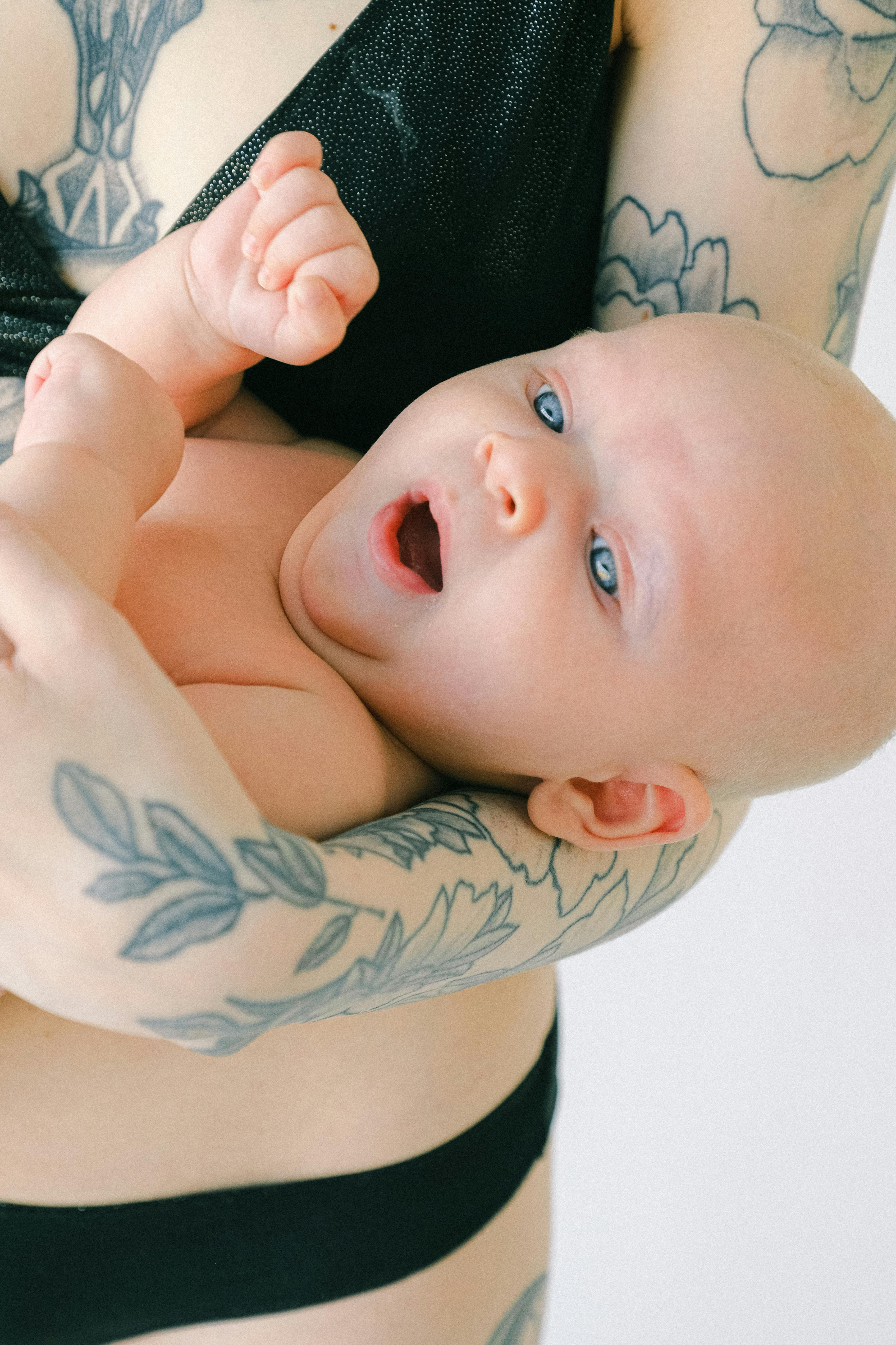 woman carrying a baby