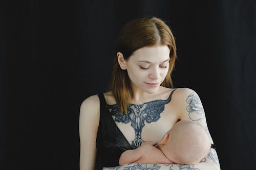 Free Mother Breastfeeding her Child Stock Photo