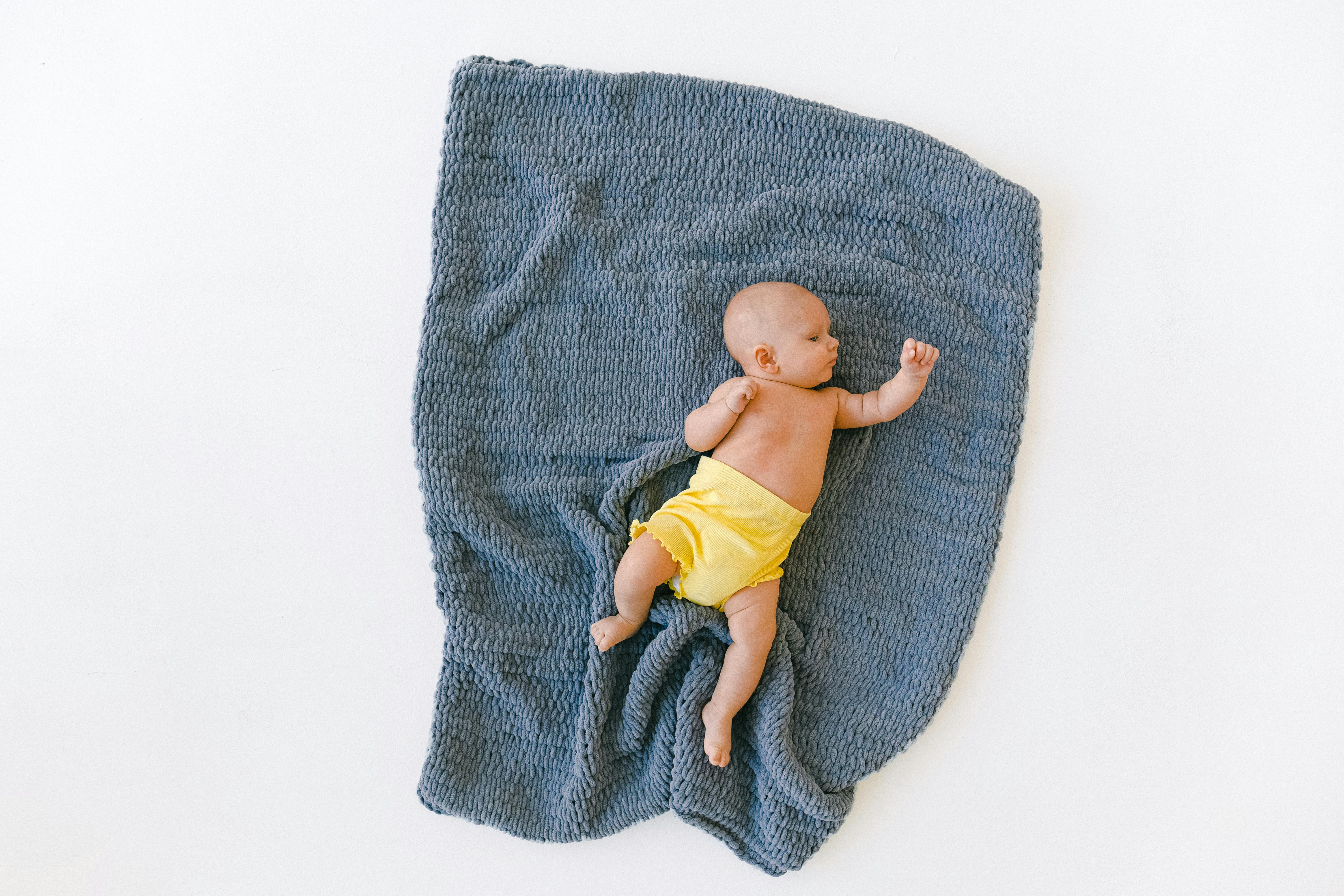 Baby Is Playing On Diapers Stock Photo  Download Image Now  Diaper Baby   Human Age Changing Diaper  iStock