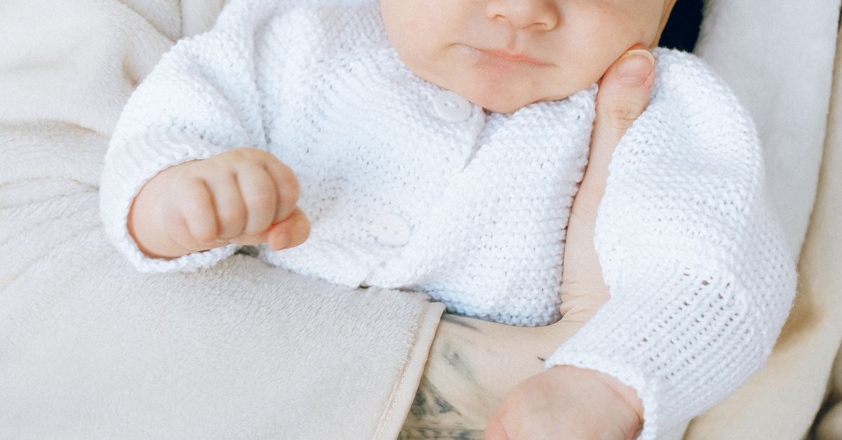 Baby In White Onesie Free Stock Photo baby-in-white-onesie-free-stock-photo
