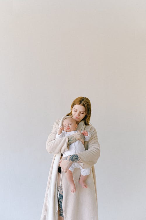 Základová fotografie zdarma na téma dítě, držení, kojenec