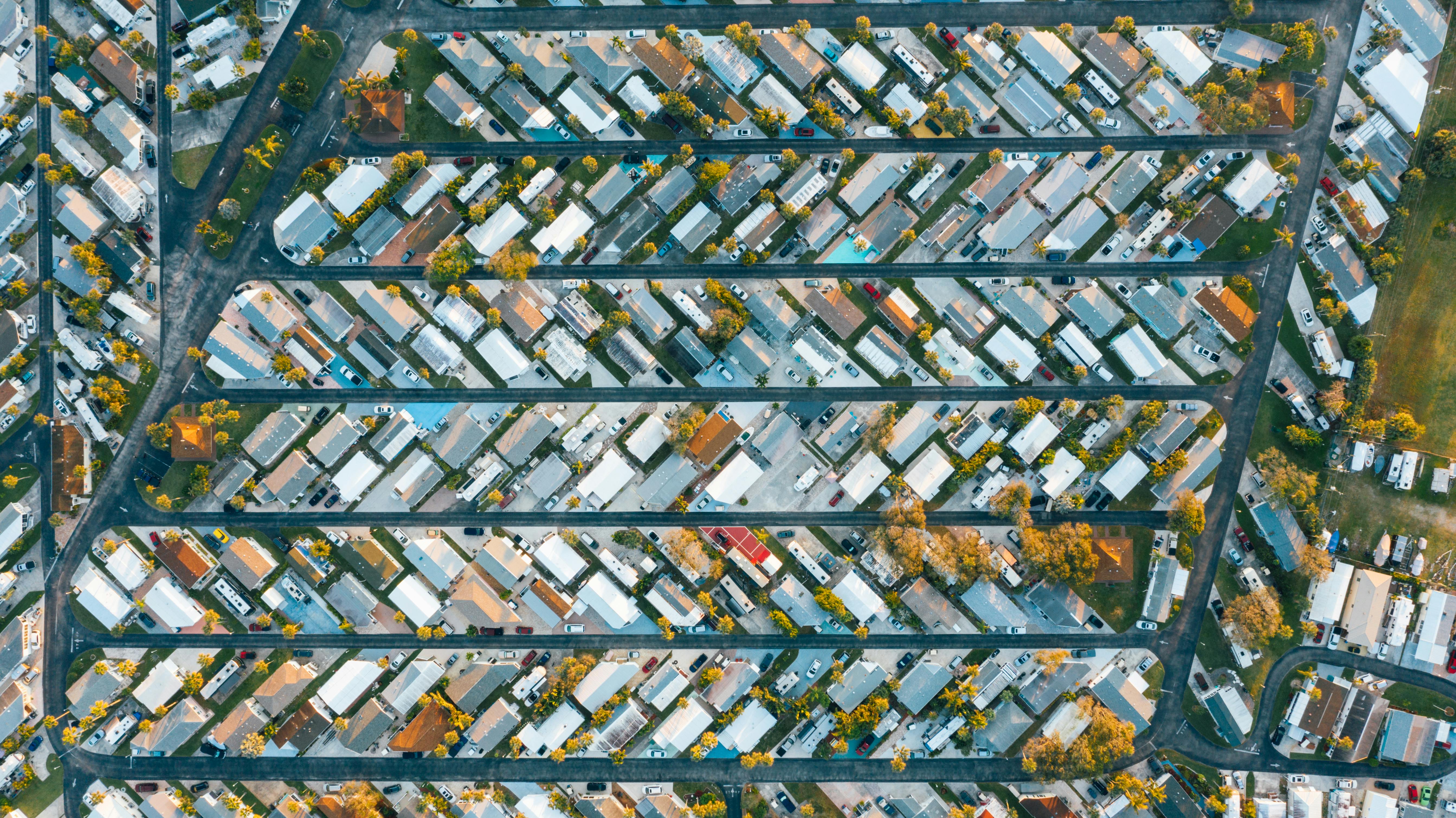 Rows of colorful roofs of houses in modern village
