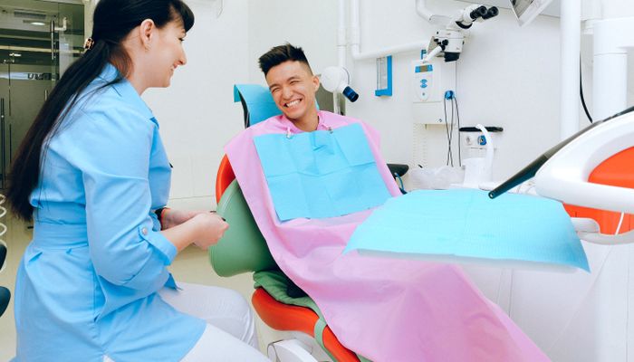 Cheerful patient smiling at Bansal Dentistry Mississauga