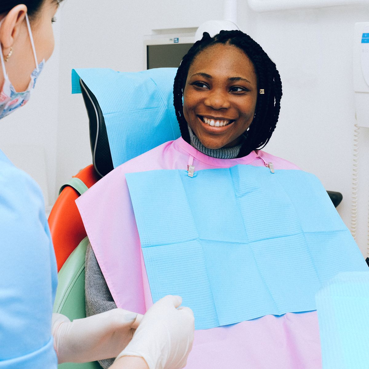 Patient smiling after successful emergency dental treatment