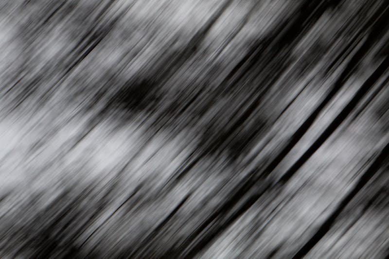 Elegant woman applying 24 Faubourg perfume to her wrist