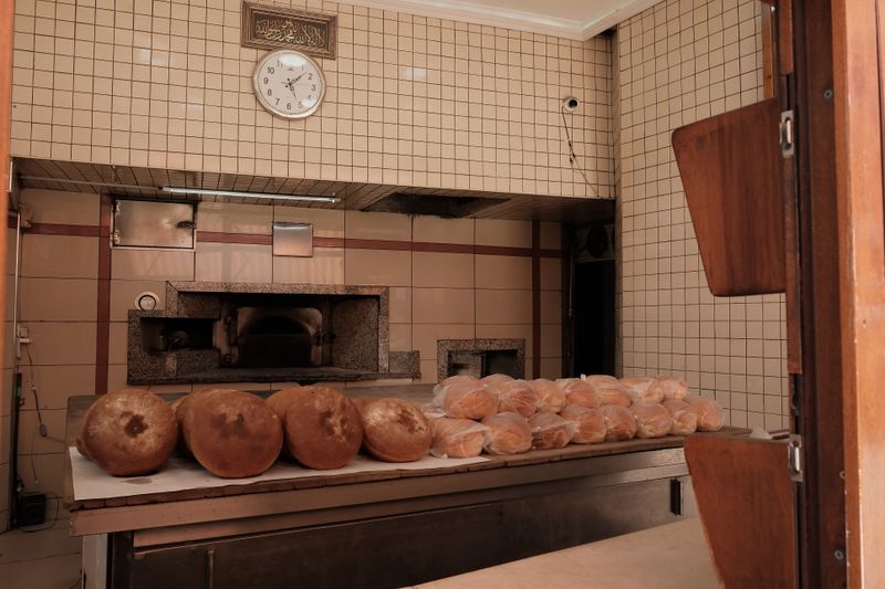 Inside view of a traditional Turkish bakery in Sakarya with fresh bread loaves on display.