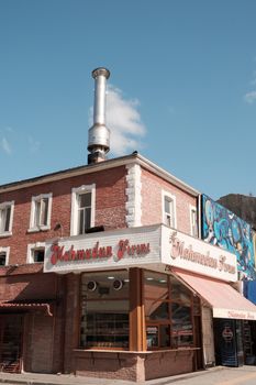 Rustic bakery storefront in Sakarya, Türkiye with bright skies and traditional architecture.