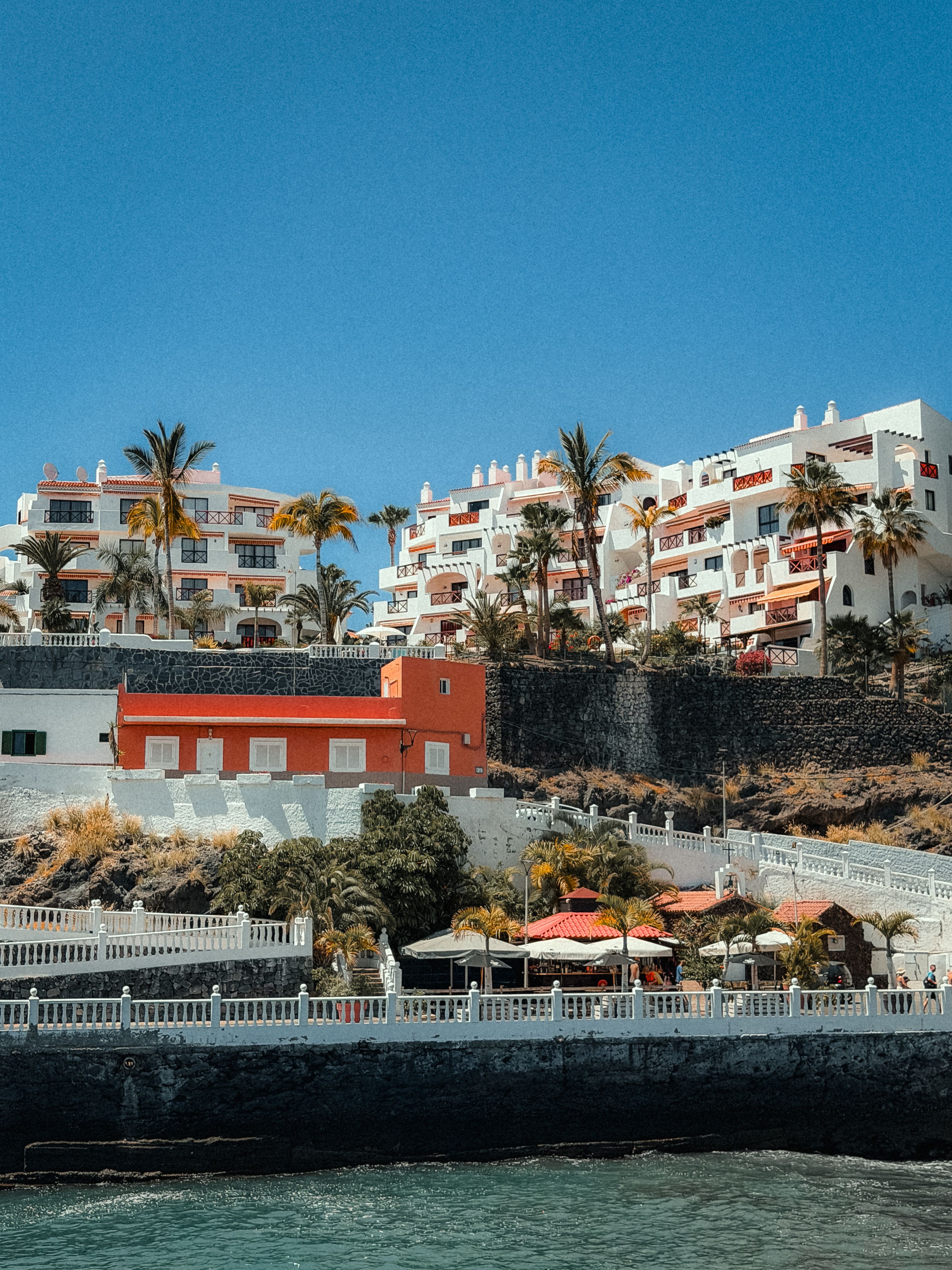 Scenic view of Spanish architecture along the coast of Puerto de Santiago, Canary Islands.