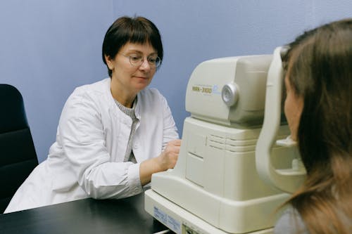 Free Photo Of Opthalmologist Checking On A Patient Stock Photo
