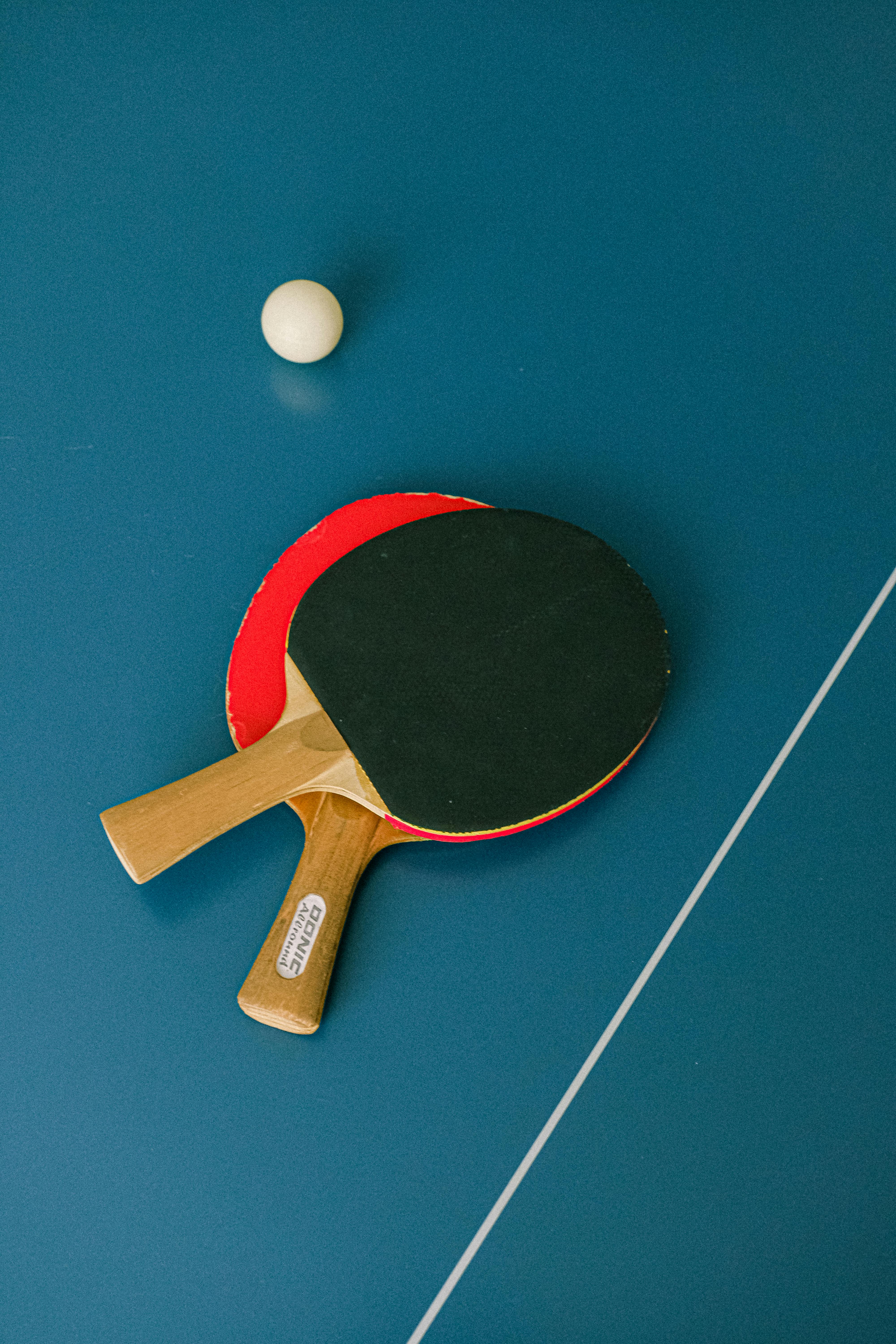2 red and green table tennis racket bat Royalty Free Vector